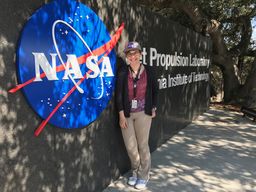 Walker's graduate Morgan Locandro '16 standing in front of NASA sign