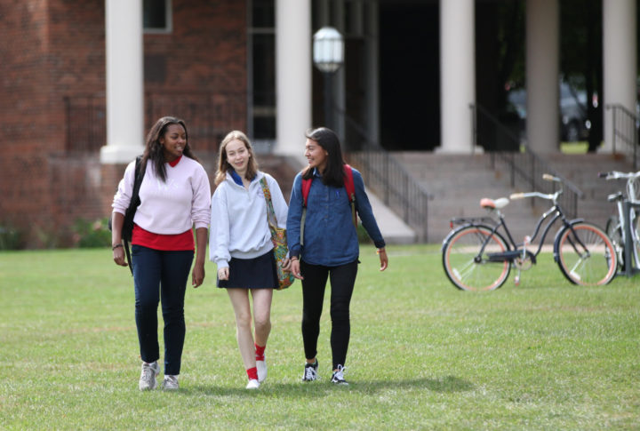 Girls walking on campus