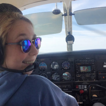 Jordana Doshna flying a plane