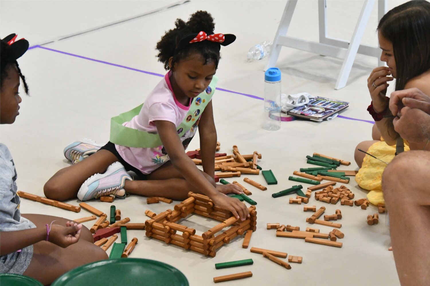 Horizons-at-The-Ethel-Walker-School-Student-Uses-lincoln-logs-during-Annual-STEAM-Expo