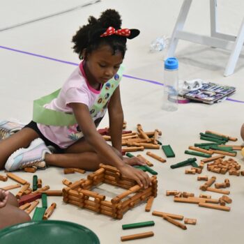 Horizons-at-The-Ethel-Walker-School-Student-Uses-lincoln-logs-during-Annual-STEAM-Expo